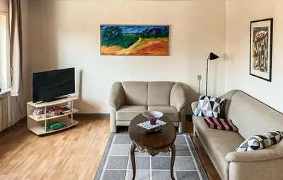 a living room with two couches and a tv at Amazing Home In Harboøre With Wifi in Harboør
