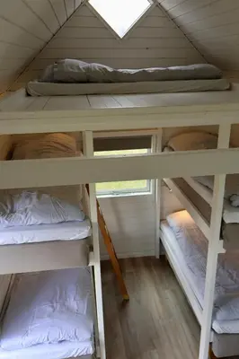 two bunk beds in a tiny house at Aalborg Hytteø in Aalborg