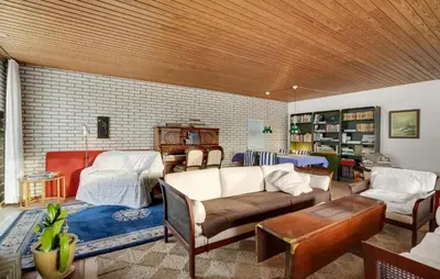 a living room with a couch and a table at 2 Bedroom Pet Friendly Home In Thisted in Thisted