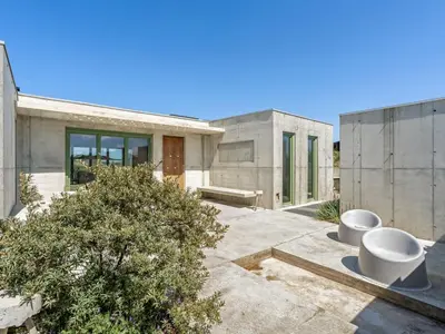 a house with two toilets in front of it at Holiday Home Rieke - 250m from the sea by Interhome in Torsted