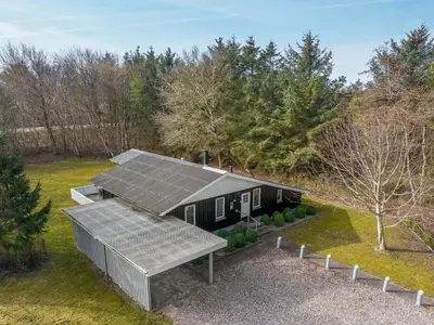 an overhead view of a house with solar panels on it at Holiday Home Iris - 200m to the fjord by Interhome in Thyholm