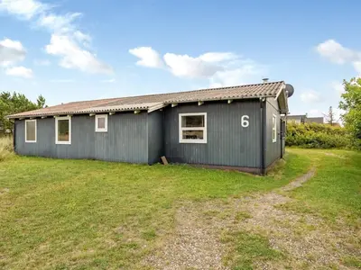 a gray house with the number on it at Holiday Home Claudine - 700m from the sea by Interhome in Thisted