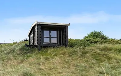 a tiny house sitting on top of a hill at Pet Friendly Home In Vestervig With Wifi in Vestervig
