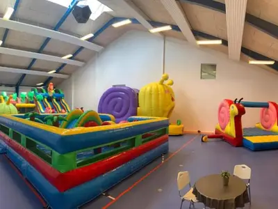 a play room with many different types of play equipment at 4 star holiday home in Thyborøn in Thyborøn