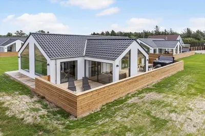 a modular home with a deck and a house at 871-Thisted-Smedevej-3-A in Thisted