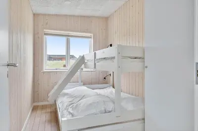 a white bunk bed in a room with a window at 158-Thisted-Lyngbakken-8 in Thisted