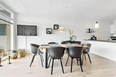 a dining room with a table and chairs at 781-Thisted-Havstokken-28-A in Thisted