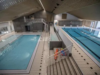 a large swimming pool in a building at 4 star holiday home in Thyborøn in Thyborøn