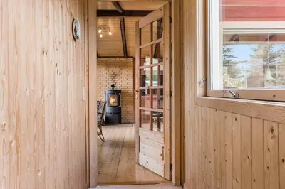 a hallway of a house with a stove in it at 421-Thisted-Fiskervej-147 in Nørre Vorupør