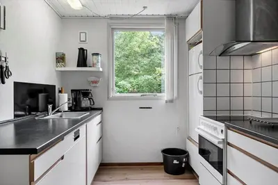 a kitchen with a sink and a window at 724-Vestervig-Kanalvej-24 in Tåbel