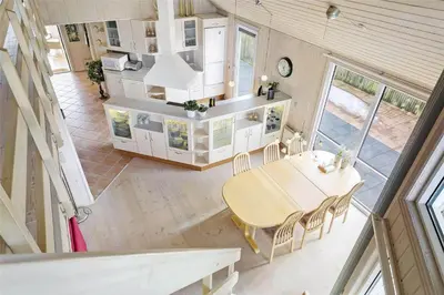 an overhead view of a dining room and kitchen in a tiny house at 644-Thisted-Kristinesvej-4 in Thisted