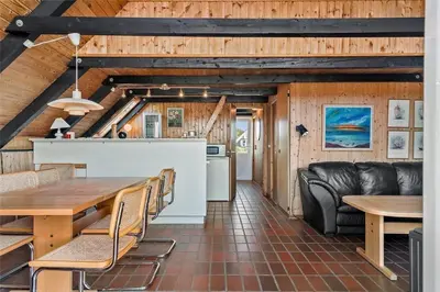a kitchen and dining room with a table and chairs at 465-Thisted-Havbovej-25 in Thisted