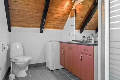 a bathroom with a toilet and a sink at 465-Thisted-Havbovej-25 in Thisted