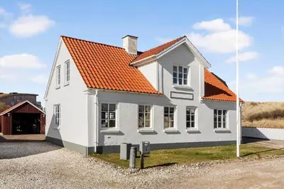 a white house with an orange roof at 823-Thisted-Knottivej-3 in Thisted