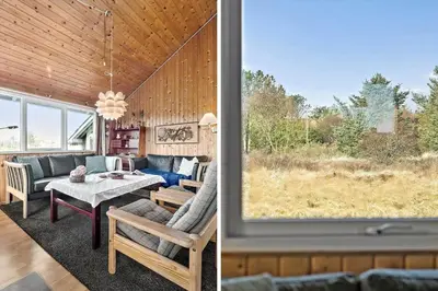 a living room with a couch and a table at 323-Thisted-Pighvarvej-27 in Thisted