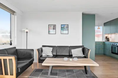 a living room with a couch and a coffee table at 106-Thisted-Simonsvej-6 in Thisted