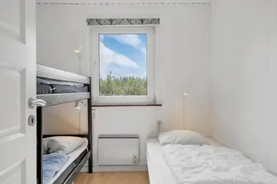 a small room with two beds and a window at 780-Thisted-Molgaardsvej-60 in Thisted