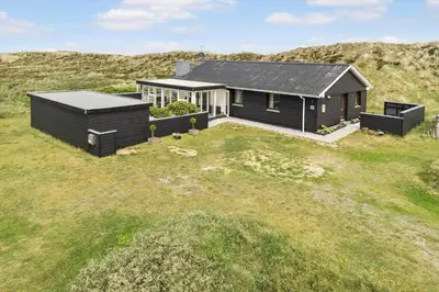 a black house in the middle of a field at 325-Thisted-Sotungevej-35 in Thisted
