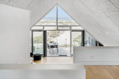 an open living room with a view of the ocean at 792-Thisted-Havstokken-22-1 in Thisted