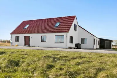 a large white house with a red roof at 1017-Thisted-Hvidbakken-17 in Torsted