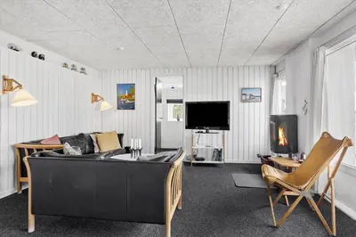 a living room with a couch and a tv at 518-Thisted-Klemsvej-18 in Thisted