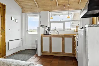 a kitchen with a sink and a counter top at 273-Snedsted-Sarasvej-33 in Snedsted