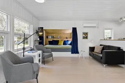 a living room with a couch and a bed at 630-Thisted-Kristinesvej-40 in Thisted