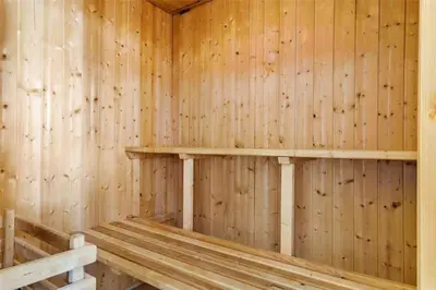 a wooden interior of a sauna with wooden walls at 615-Thisted-Julius-Poulsens-Vej-7 in Thisted