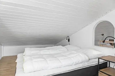 a white bed in a room with a white ceiling at 652-Thisted-Orredvej-58 in Thisted