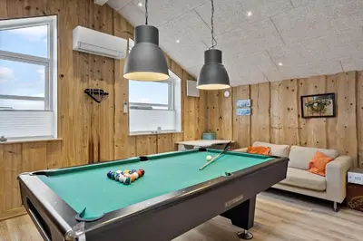 a pool table in a room with wooden walls at 898-Thisted-Nordsovej-46-B in Thisted