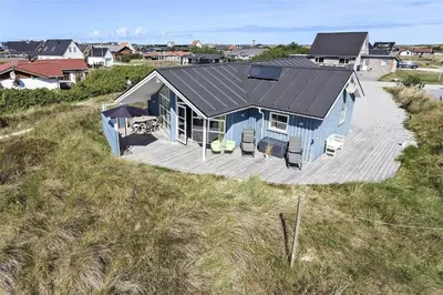 an aerial view of a blue house on a beach at 898-Thisted-Nordsovej-46-B in Thisted