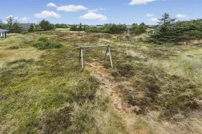 an empty field with a swing in the grass at 803-Thisted-Hummervej-3 in Thisted