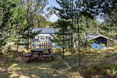 a picnic table in front of a house at 257-Thisted-Blamunkevej-34 in Thisted