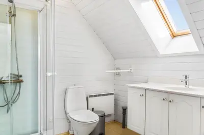 a bathroom with a toilet and a sink at 541-Thisted-Nordsovej-49 in Thisted