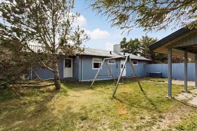 a swing set in a yard in front of a house at 337-Thisted-Hummervej-11 in Thisted