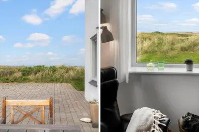 a room with a window with a chair and a table at 303-Thisted-Hotelvej-5-F in Thisted