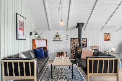 a living room with a couch and a table at 620-Thisted-Pighvarvej-20 in Thisted