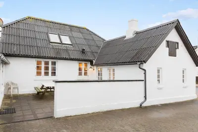 a white house with a black roof at 893-Thisted-Vesterhavsgade-148 in Thisted