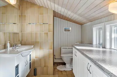 a bathroom with a sink and a toilet at 711-Thisted-Blamunkevej-24 in Thisted