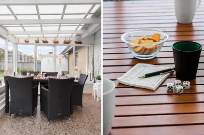 a table with chairs and a bowl of fruit on it at 110-Vestervig-Svanholmvej-10 in Vestervig