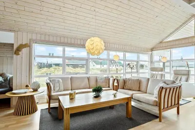 a living room with a couch and a table at 362-Thisted-Ostersvej-1 in Thisted