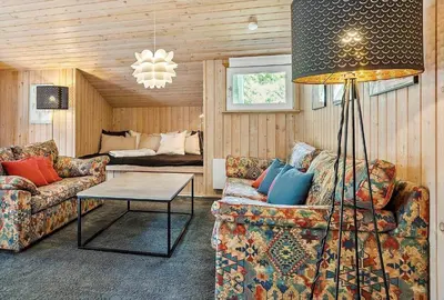 a living room with a couch and a table at 466-Thisted-Muslingevej-6 in Thisted