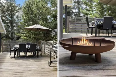 a fire pit on a deck with a table and chairs at 466-Thisted-Muslingevej-6 in Thisted