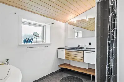 a bathroom with a sink and a shower at 433-Thisted-Tunvej-20 in Thisted