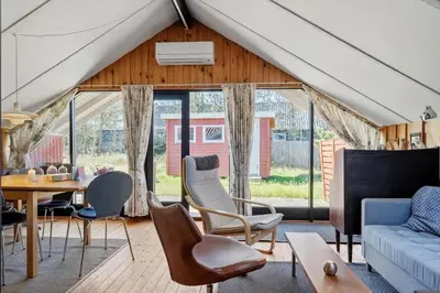 a living room with a couch and chairs at 340-Thisted-Delfinvej-25 in Thisted