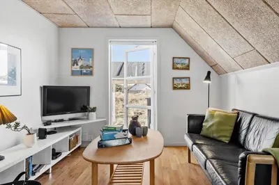a living room with a couch and a table at 718-Thisted-Orredvej-36 in Thisted