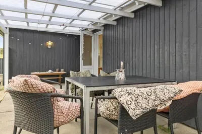 a patio with a table and some chairs at 635-Thisted-Store-Knuds-Vej-6 in Thisted