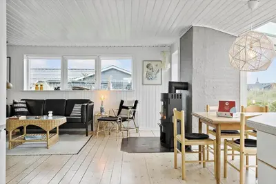 a living room with a couch and a table at 635-Thisted-Store-Knuds-Vej-6 in Thisted