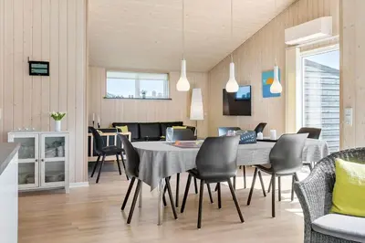 a kitchen and dining room with a table and chairs at 524-Thisted-Flyndervej-4 in Thisted