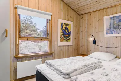 a bedroom with a bed in a room with a window at 318-Thisted-Nordsovej-204-A in Thisted